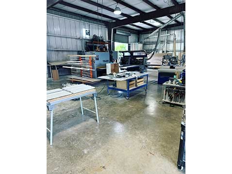 A workshop with several workstations and tools