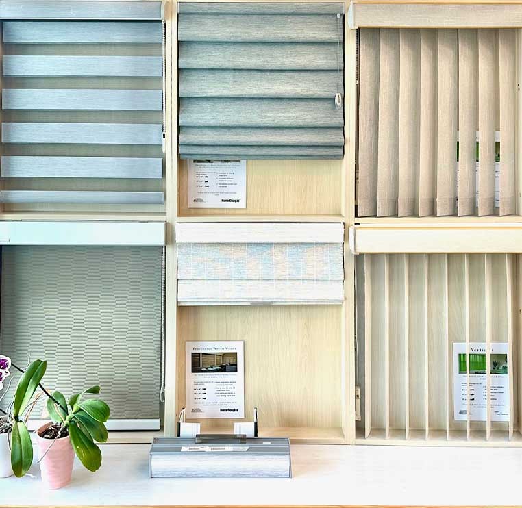 A display of several different window coverings